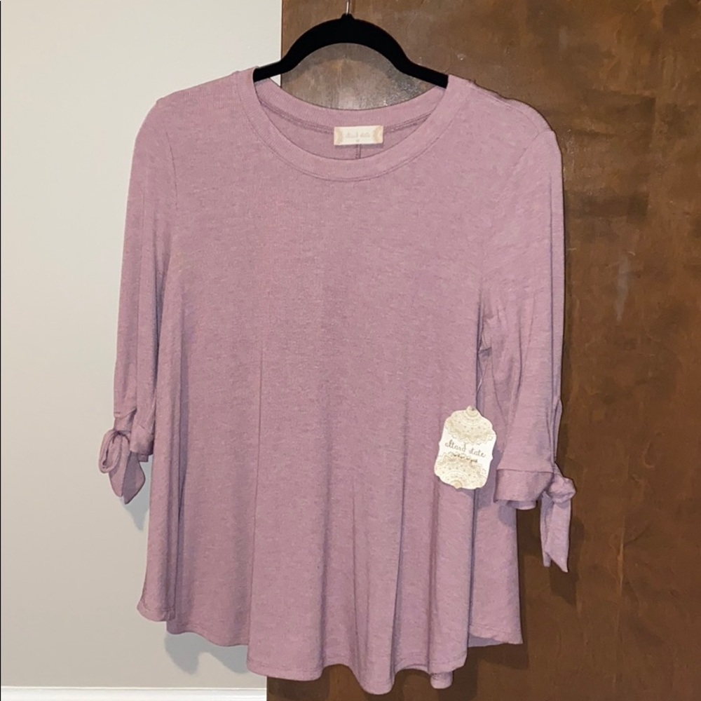 Beautiful rose colored sweater from altered state
